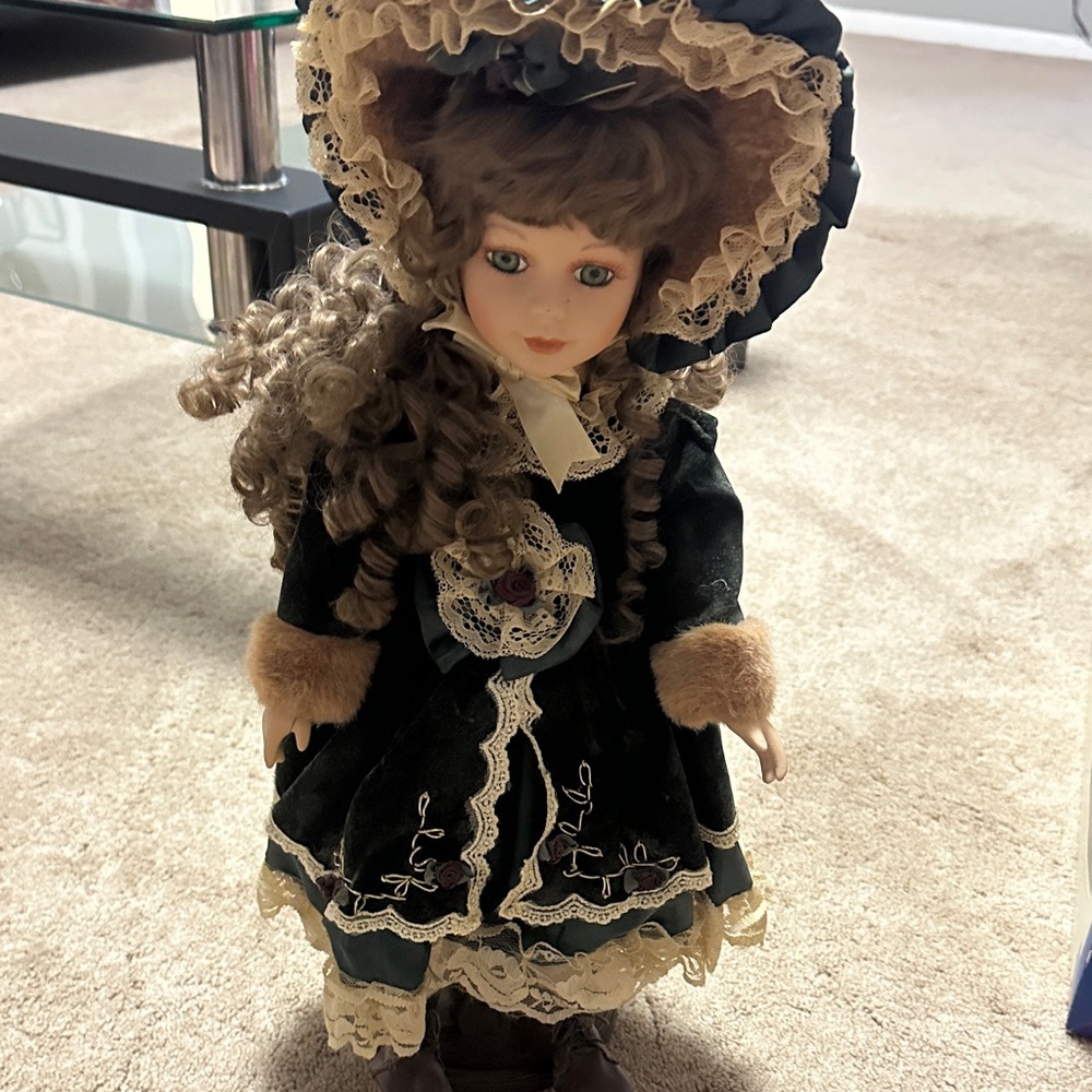 Elegant Victorian Doll with Black and Cream Dress